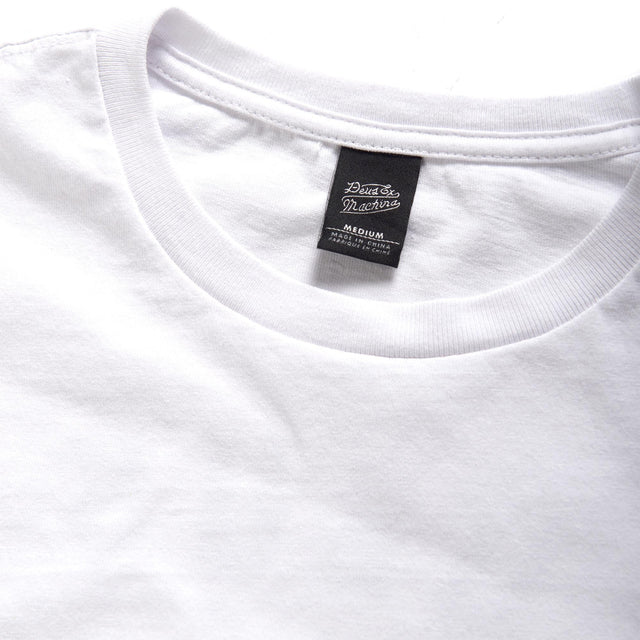 White regular fit classic l/s t-shirt with chest art and address back print, 190gm oe 100% cotton jersey fabrication with a garment wash