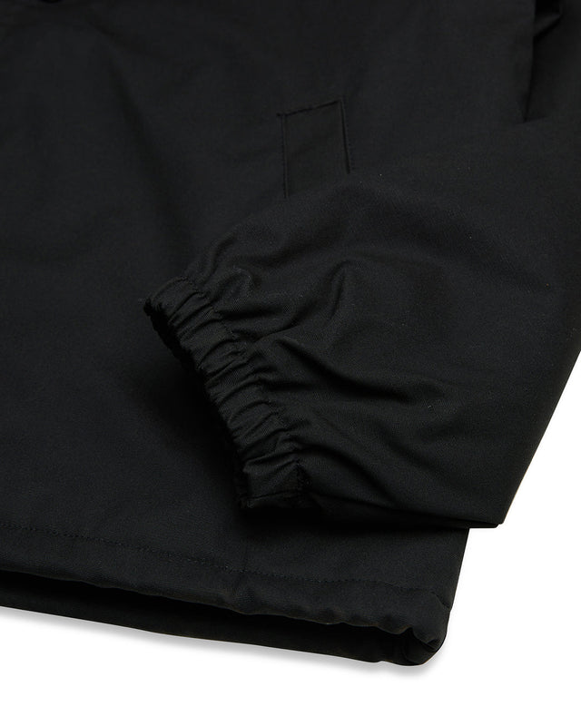 Chaqueta deportiva negra con logotipo de Pill