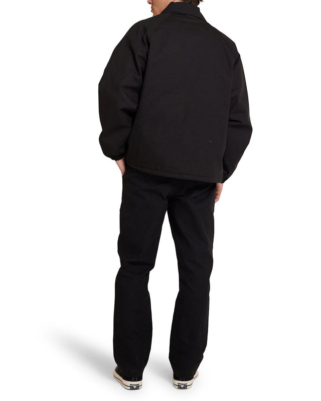 Chaqueta deportiva negra con logotipo de Pill